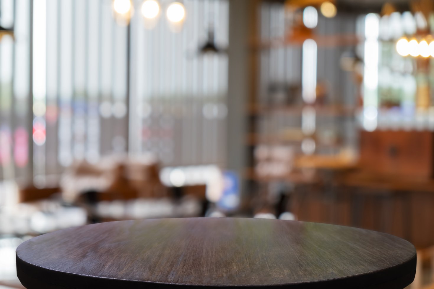 Empty Wooden Table with Restaurant Cafe Background